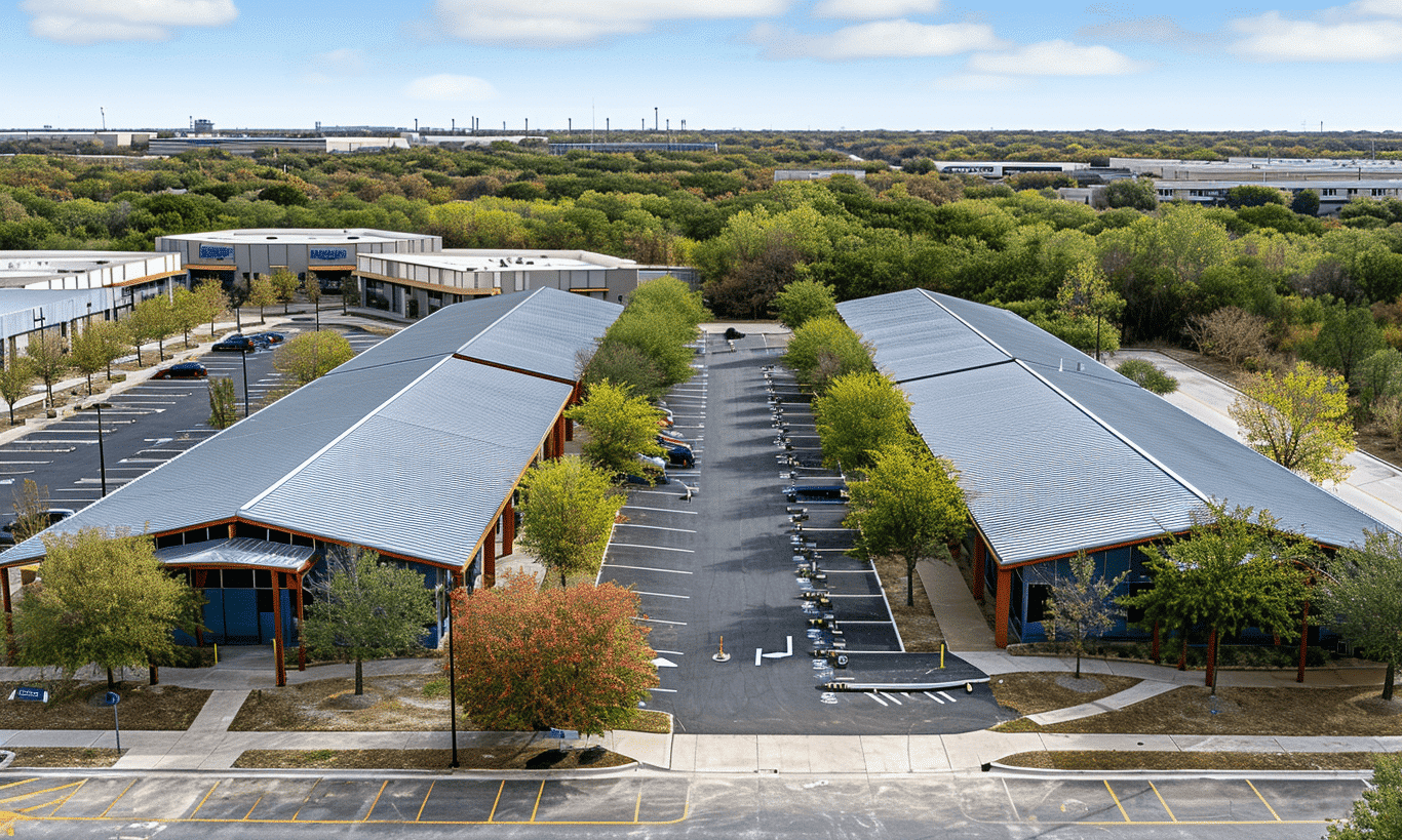 "Urban skyline featuring modern city buildings with a spacious parking lot nearby"