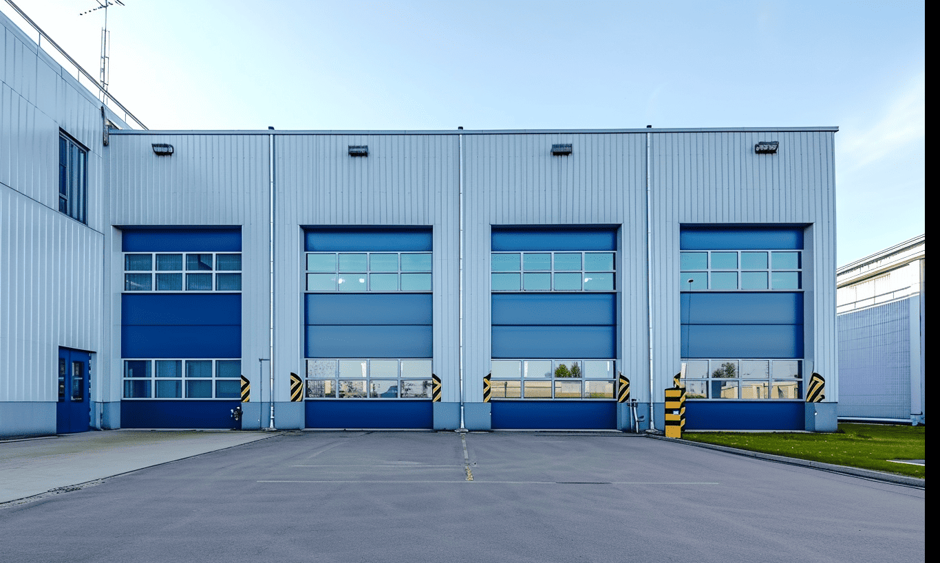 Stunning view of an industrial building featuring vibrant blue windows reflecting the sky.