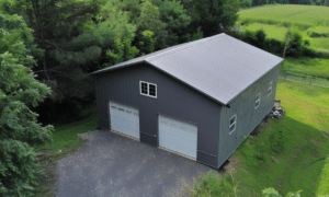 Aerial view of British Columbia steel garage kits with clear landscapes and organized structures, showcasing premium quality building solutions.