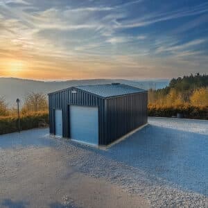 16x24 metal shed in a backyard, showcasing spacious storage with durable steel construction and a modern, weather-resistant design.