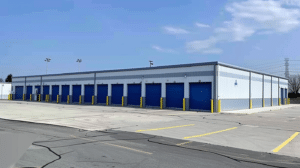 Large blue door storage buildings designed for secure and convenient storage solutions in various settings.