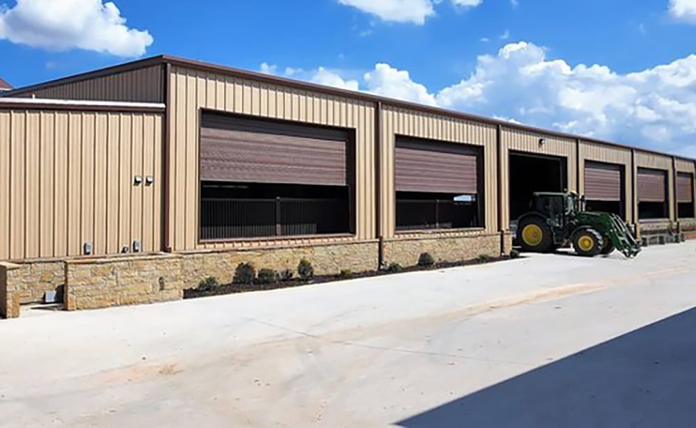 Modern farm equipment storage facility showcasing organized machinery kept secure and sheltered for optimal agricultural use.