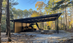 Sleek modern carport with a durable metal roof providing stylish vehicle protection in a contemporary setting.